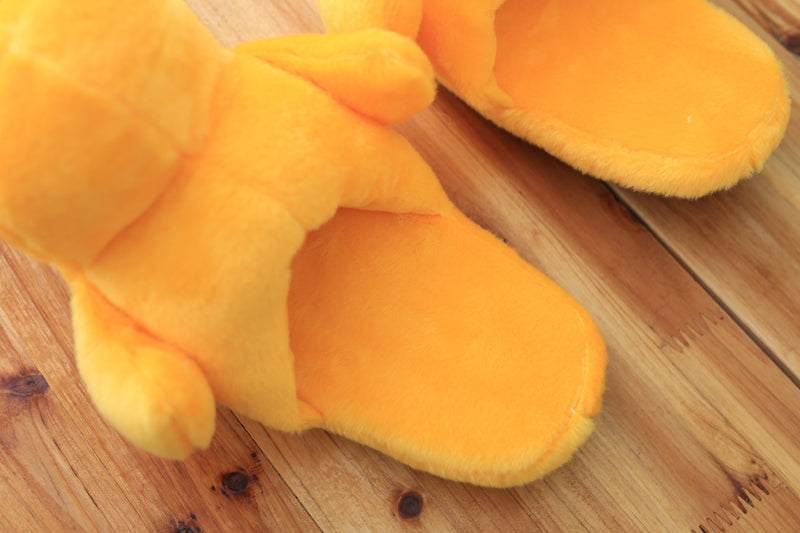 Plush duck slippers with open heel.