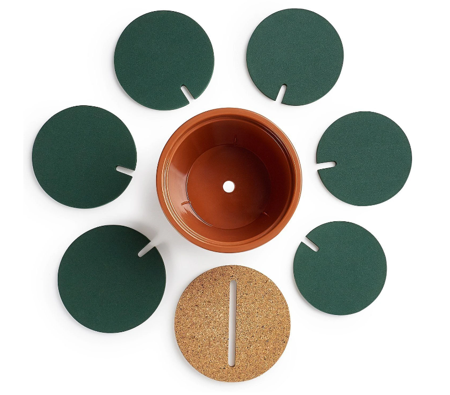 CACTUS COASTER WITH FLOWER POT HOLDER. A funhome product. Simple design. Consist od a flower pot, coaster holder and six coasters.