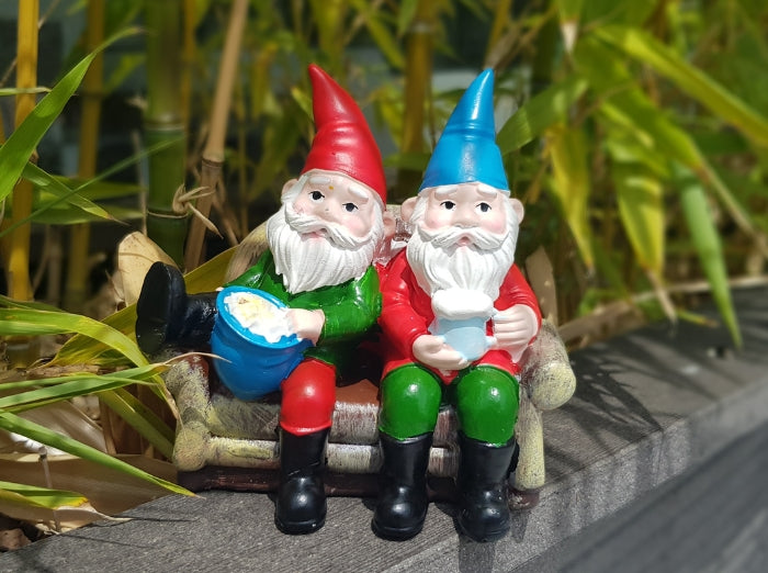 BUDDIES RELAXING ON SOFA GARDEN GNOMES. Fun and funny garden decoration for a friend, girlfriend or a boyfriend.