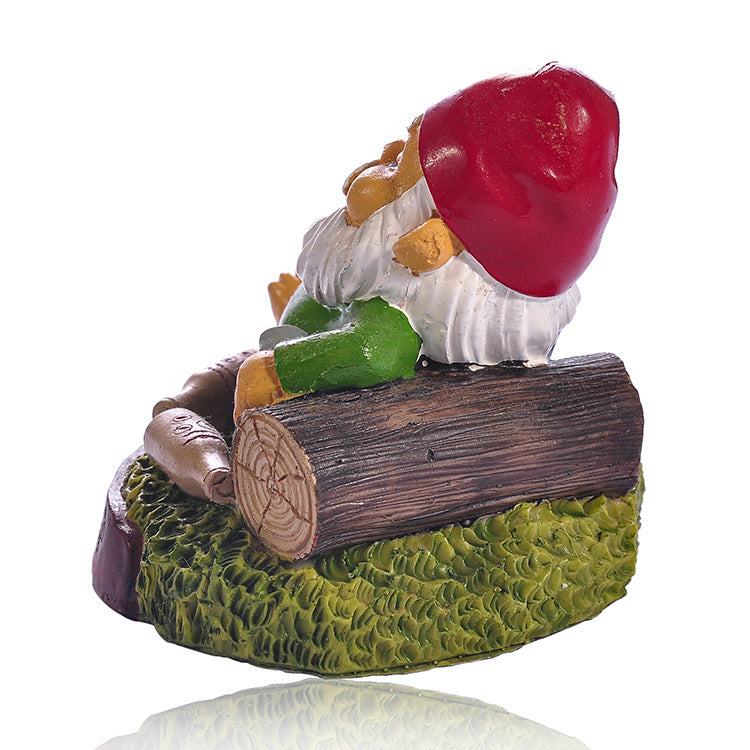 MACHINE GUN GARDEN GNOME. Fun and funny product for home seen from the side.