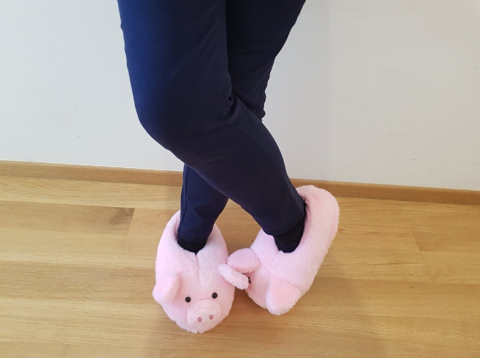 Wearing pig slippers