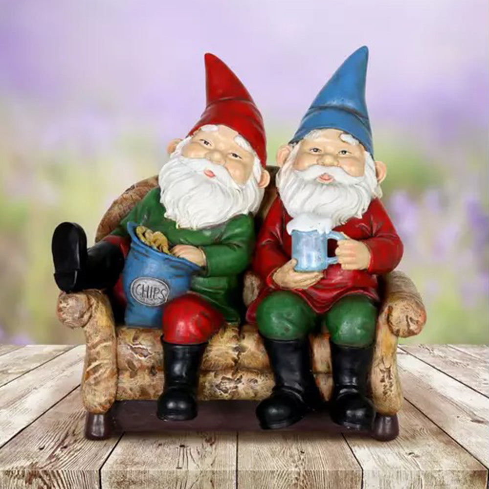BUDDIES RELAXING ON SOFA GARDEN GNOMES. Fun and funny garden decoration for a friend, girlfriend or a boyfriend.