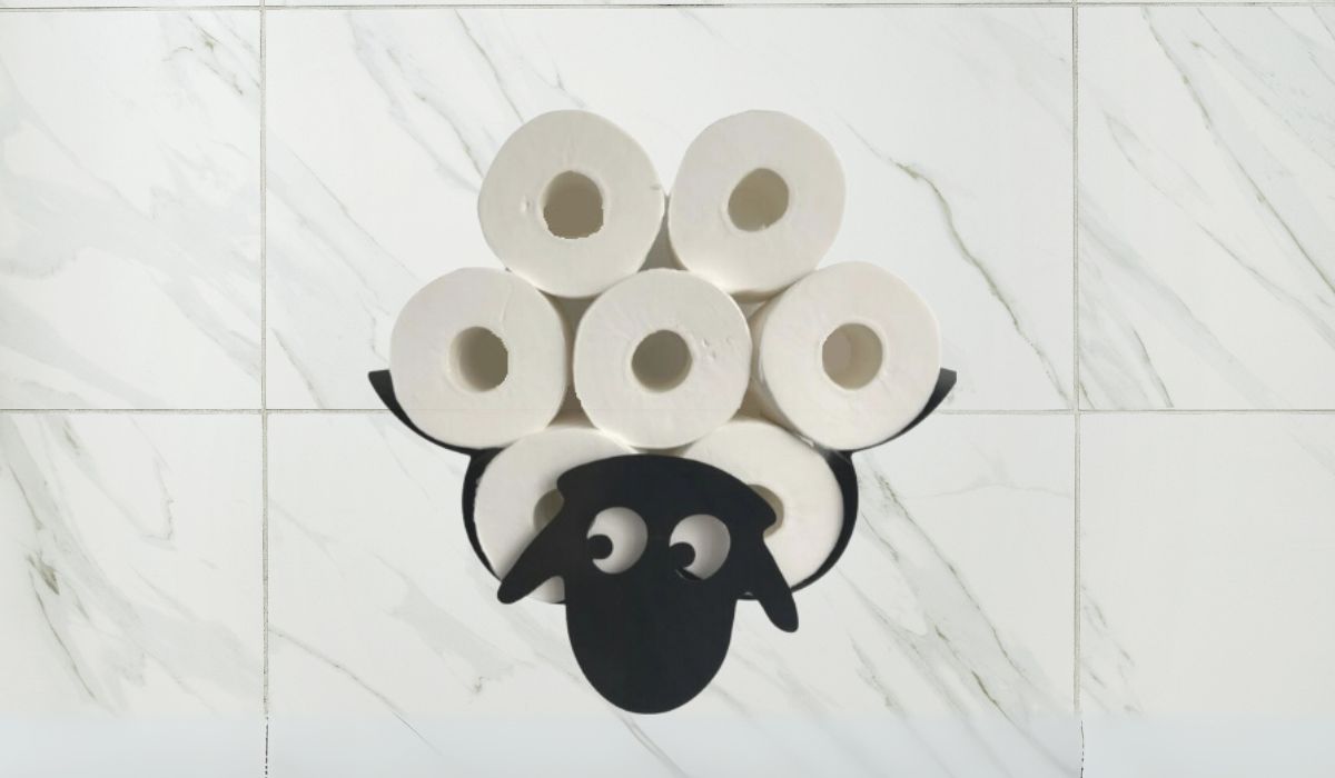 WALL MOUNTED SHEEP TOILET ROLL HOLDER. A funny gift for women mounted on the wall.